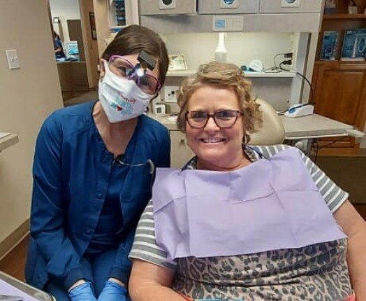 Copperas Cove dental team member and patient smiling together