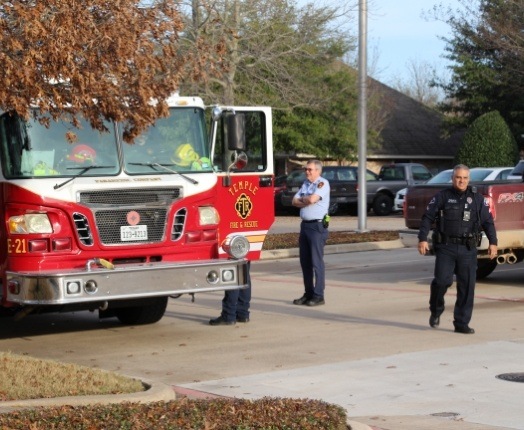 Firefighters and fire truck at community event