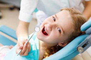 child at the dentist