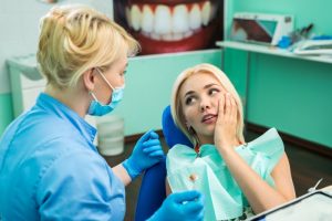 woman visiting emergency dentist in Copperas Cove