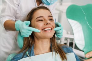 patient smiling in dental chair